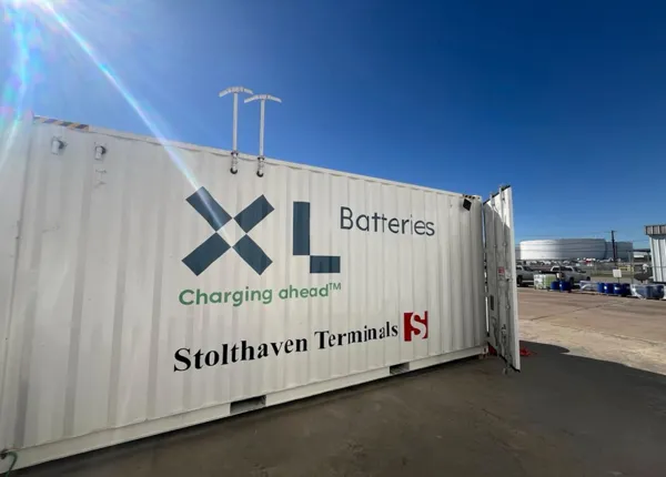 A shipping container holds XL Batteries' demonstration battery equipment.